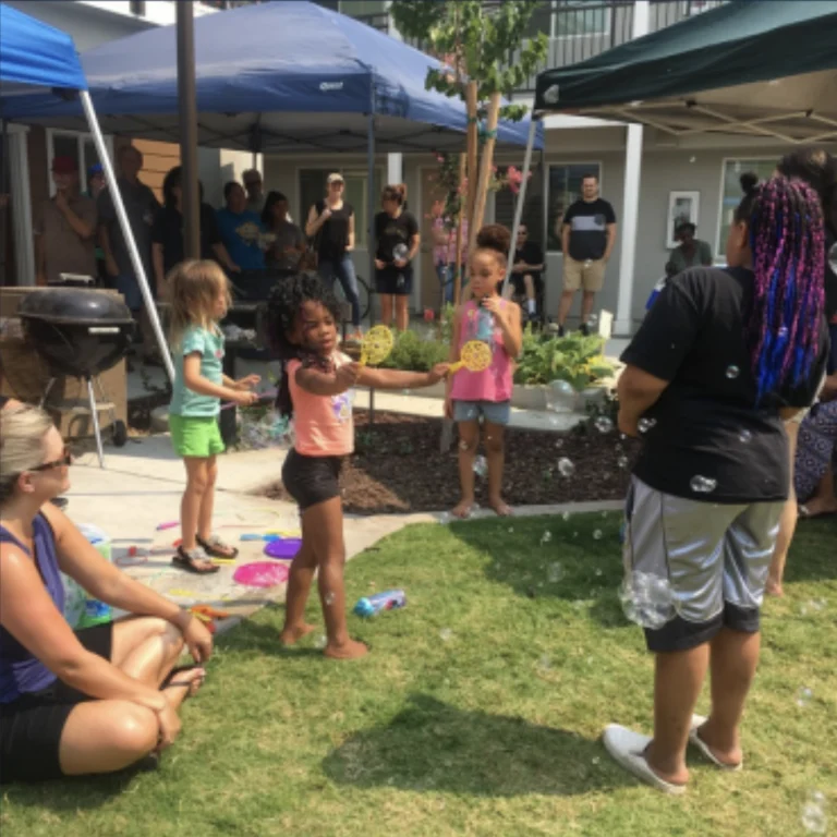kids playing on grass in apartment complex